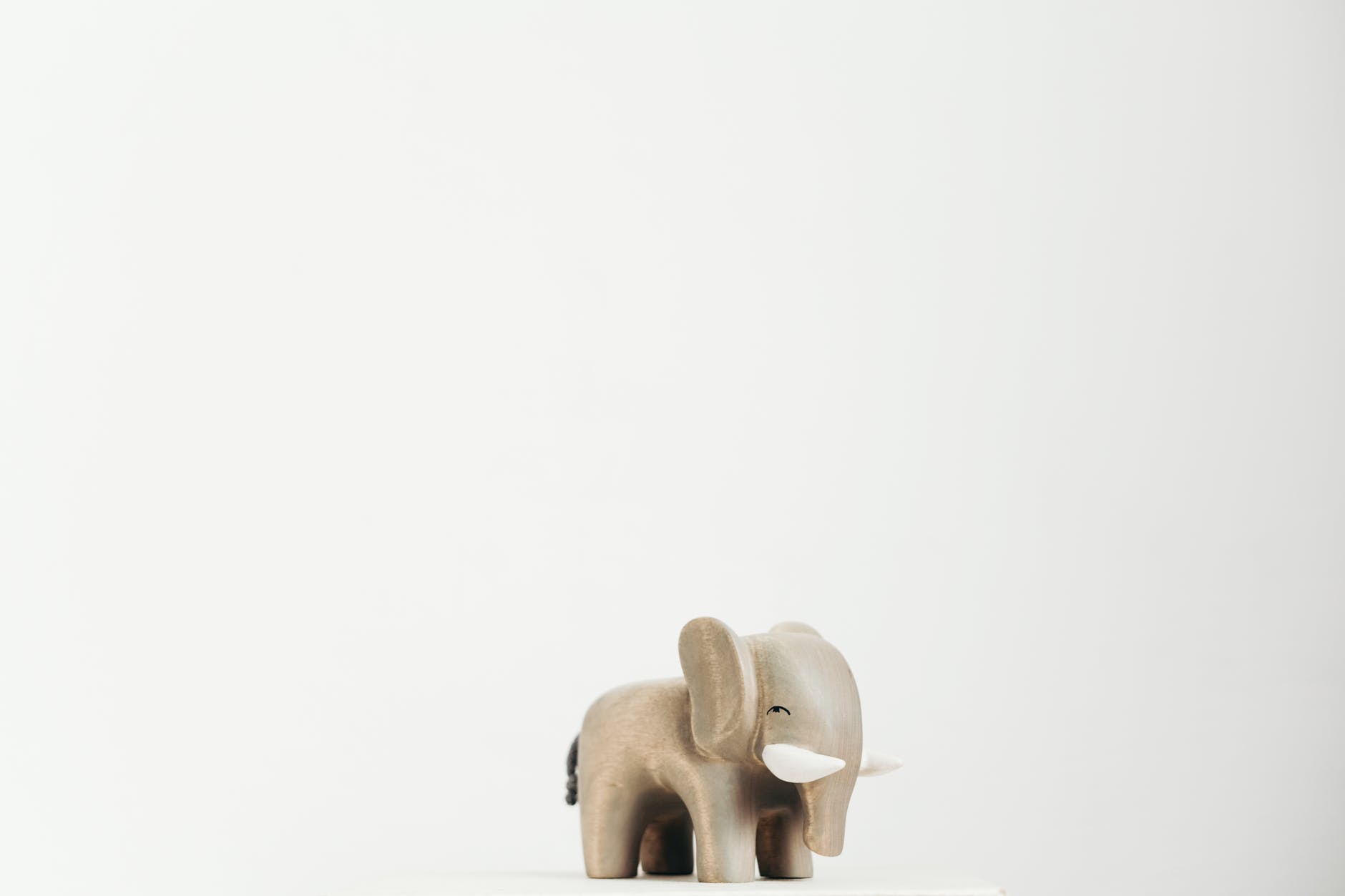 wooden elephant with white background