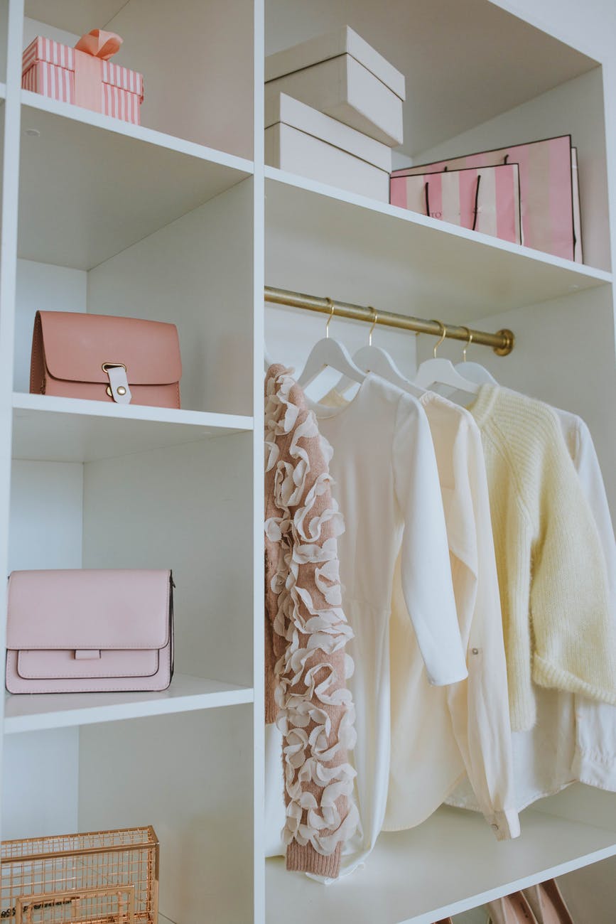 a white wooden closet of a woman