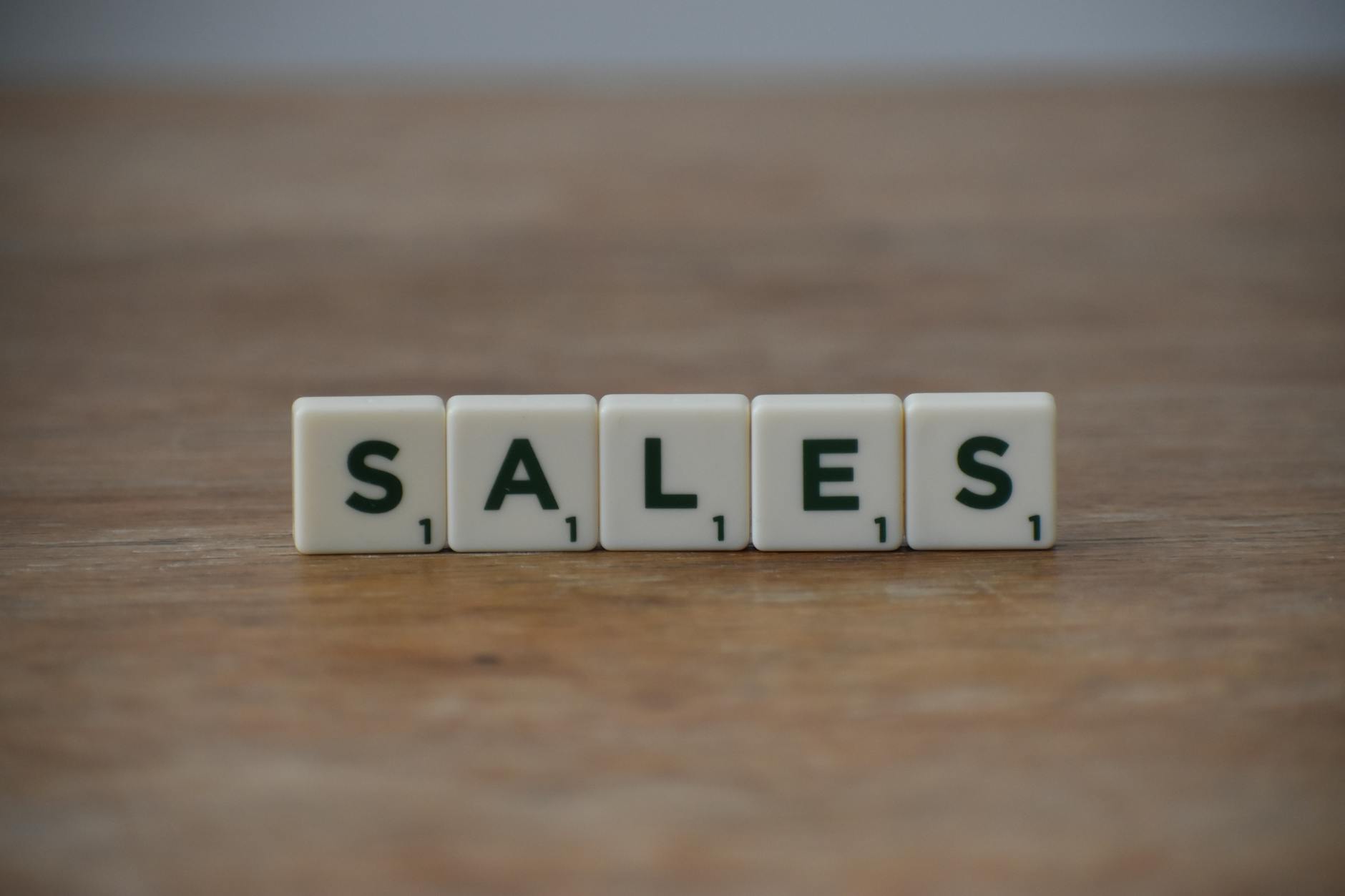 sales word on wooden table